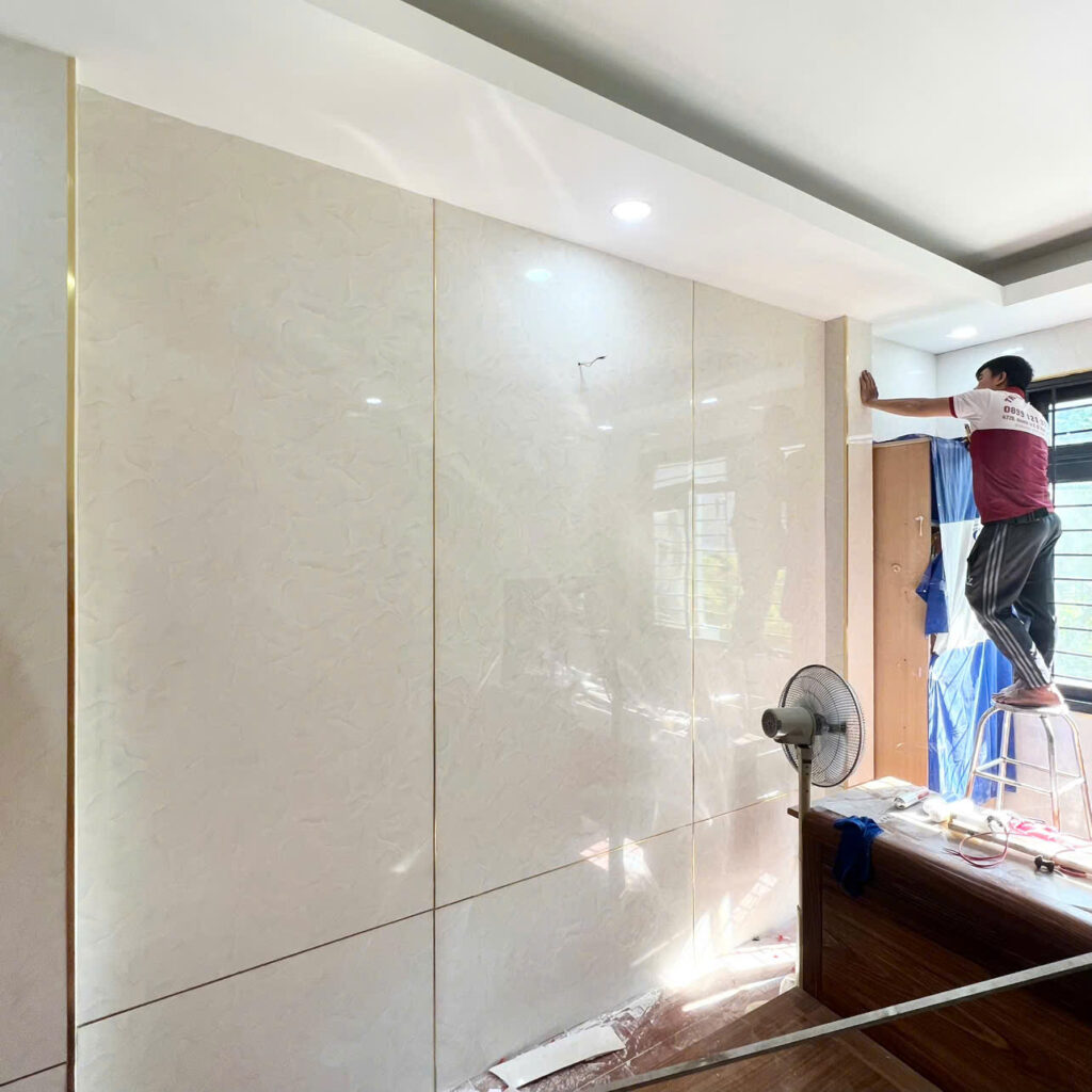 Thi công tấm PVC giả đá ốp tường